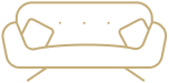 A long, cushioned bench with a light-colored top and dark base, situated in a communal space with neutral-colored flooring.